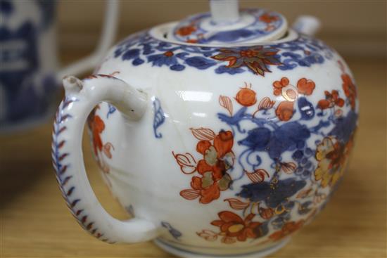 Three Chinese blue and white mugs, Qianlong period and a Chinese Imari teapot and cover, early 18th century tallest 15cm